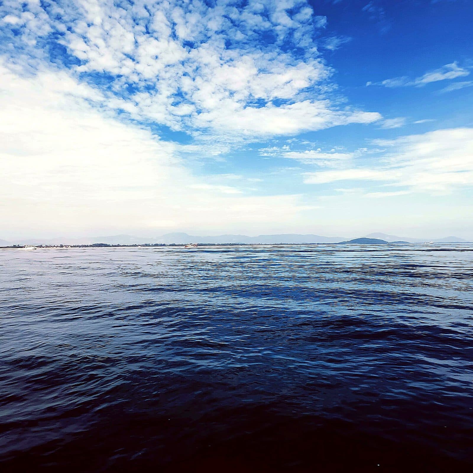 Open water and a wide sky off Pulau Redang — the sea you cross to reach the island